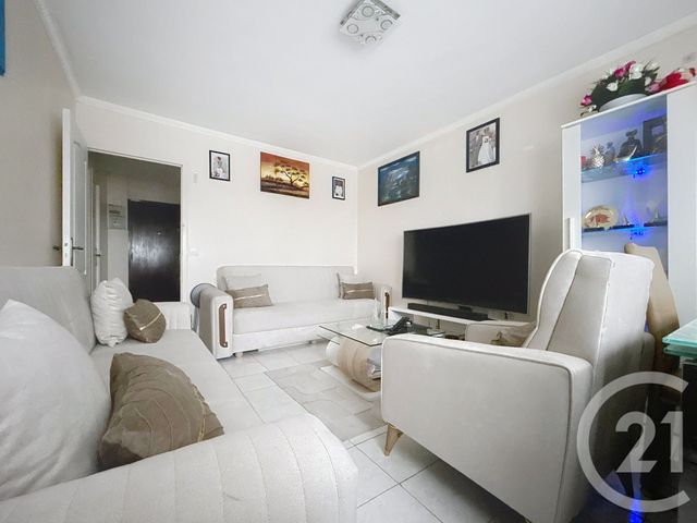 Appartement à vendre - 4 pièces - 74.16 m2 - EPINAY SUR SEINE - 93 - ILE-DE-FRANCE - Century 21 Le Domaine