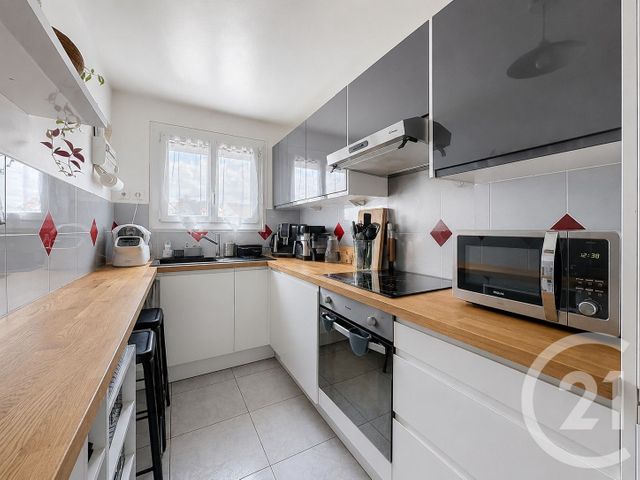 Appartement F4 à vendre - 4 pièces - 94.64 m2 - MONTMAGNY - 95 - ILE-DE-FRANCE - Century 21 Le Domaine
